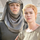 Hannah Waddingham in her Septa Unella robes holding Lena Headey's Cersei by the arms.